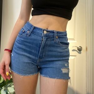 High rise dark blue Levi’s shorts